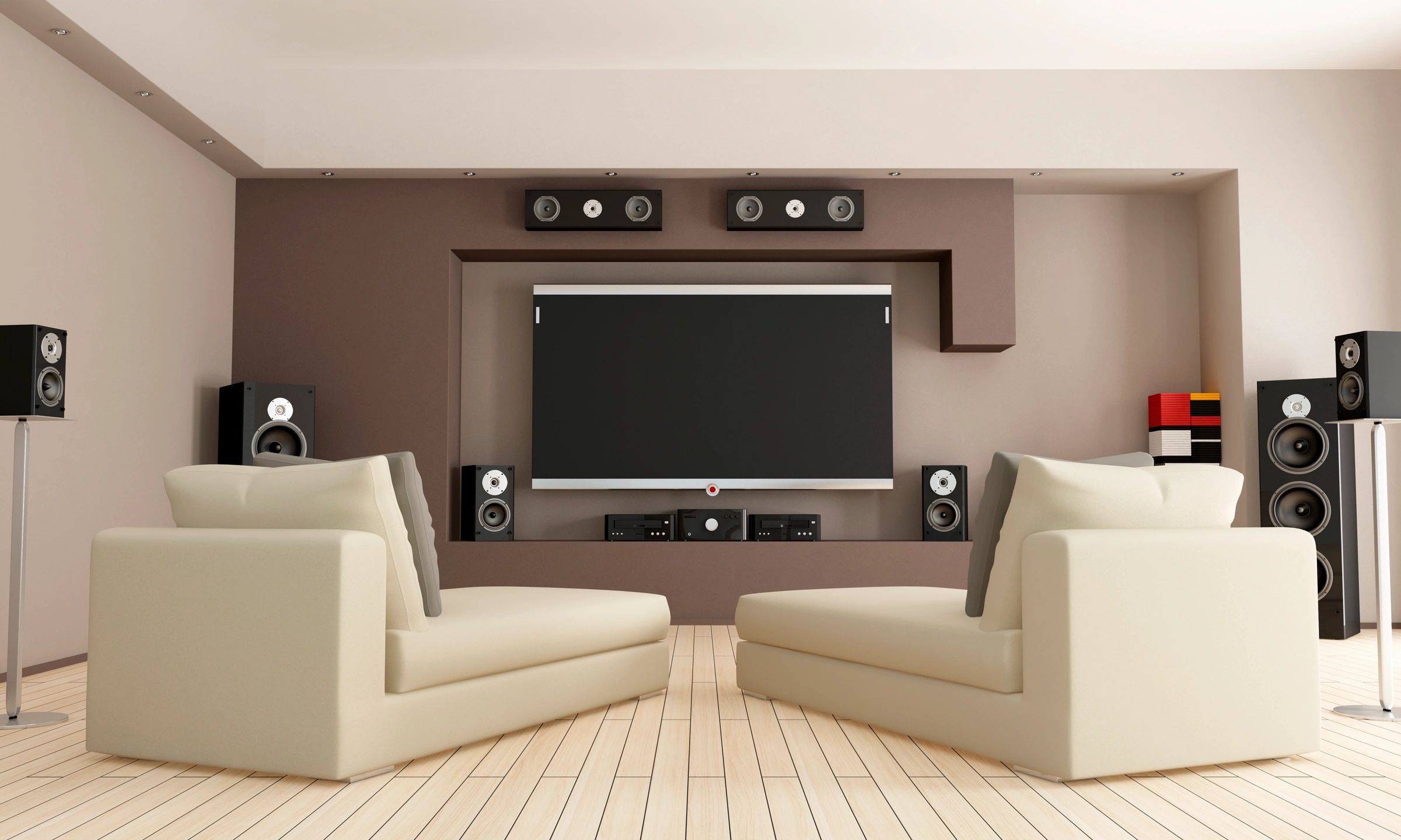 Home theater room with surround sound speakers and wall-mounted TV